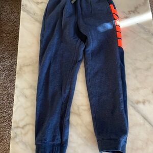 Nike- color: blue and orange, size: youth large, condition: new.